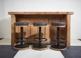 Featuring a deep cushioned seat, striking nail head trim and welting on the back, this bar stool easily transitions from the kitchen island. Bank Bar Stool Howe London