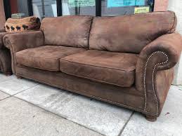 Aficionados of other types of leather furniture often look to this finish for a new way to enjoy a favorite material. Uhuru Furniture Collectibles Reduced 482370 Faux Distressed Leather Sofa By Craftmaster 275 Sold