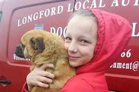 Irish girl's joy as she is reunited with stolen dog after two years
