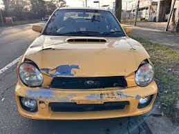 Image result for Herald Yellow 1975 Subaru