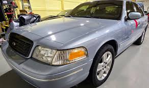 Image result for Light Ice Blue 2011 Crown Victoria