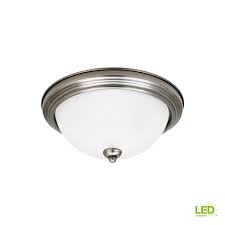 The sea gull lighting sebring one light outdoor ceiling fixture in weathered copper enhances the beauty of your property, makes your home safer and more secure, and increases the number of pleasurable hours you spend outdoors. Sea Gull Lighting Ceiling Flush Mount 3 Light Antique Brushed Nickel Flush Mount With Led Bulbs 77065en3 965 The Home Depot