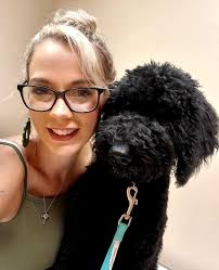 very happy and hyper pupper!! enjoyed pats but was more interested in  treats. her name is Layla