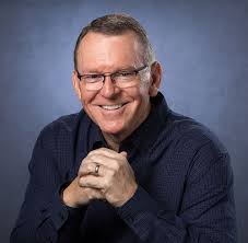 The Man Behind the Mic