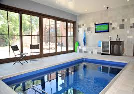 While they look great inside, they look even better in your backyard. Indoor Pool And Hot Tub Ideas Swim With Style At Home Luxury Home Remodeling Sebring Design Build