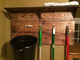 Remove all the existing end pavers. Broom Holder Out Of Old Pallets Broom Storage Broom Holder Broom Closet Organizer
