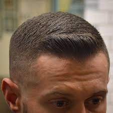 The taper is barely noticeable in some low fade haircuts for men. 17 Best High And Tight Haircuts For Men 2021 Guide Military Haircuts Men High And Tight Haircut Military Haircut