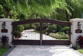 The wood gets heavy when it abosrbs moisture, this thing needs to be strong. Top 60 Best Driveway Gate Ideas Wooden And Metal Entrances