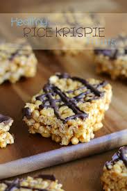And since i still have that bag of i used coconut oil instead of butter which makes them delightfully dairy free and guilt(ish) free, and even though the shredded coconut was. Healthy Rice Krispie Treats Running With Spoons