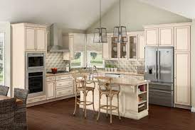 In addition to our rta store we carry pre assembled cabinets in different finishes and styles. Merillat Classic Labelle In Maple Chiffon With Desert Highlight