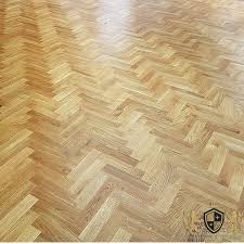 Parquet flooring unfinished solid wood herringbone blocks rustic, like reclaimed. 300x70mm Unfinished Solid Oak Parquet Herringbone Wood Flooring Block 21mm Thickness Prestige Wood Flooring Supplier