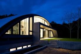 It stands 16 feet tall and spans 20 feet by 60 feet. Arc House S Historic Winning Look Metal Construction News