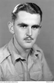 Studio portrait of VX29141 Sapper (Spr) Stanley Cameron Burke, 2/10 Field  Company, RAE, of ...