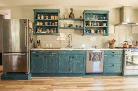 A molding that is used to provide an edge to prevent items such as dishes, especially if they are placed on an angle, from falling. Galley Kitchen W Distressed Teal Cabinets Rail Road Spike Pulls Teal Cabinets Galley Kitchen Kitchen