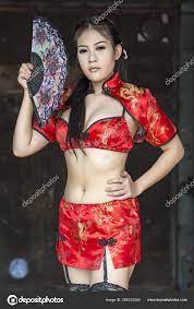 Sexy Chinese Woman Red Dress Traditional Cheongsam Stock Photo by  ©YAYImages 260310284