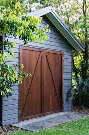 The Garden Shed Behind Which Is The Property S Water Tank Photography Brigid Arnott Shed Design Backyard Sheds Garden Shed