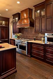 Slate appliances, or grey, create another versatile option when it comes to matching kitchen cabinet colors. Choosing The Perfect Metal Range Hoods Or Wood Range Hoods Home Remodeling Contractors Sebring Design Build