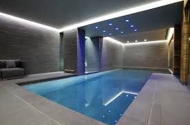 A refreshing relief from the city's buzz. 20 Striking Modern Indoor Pool Designs Home Design Lover