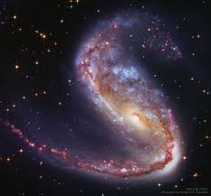 It is believed that this galaxy consumed another smaller galaxy to become the large and beautiful spiral that we observe today. Kosmos Ngc 2442 Galaxy In Volans Distorted Galaxy Ngc Facebook