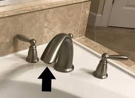 The white and bone tubs pictured here are center drain standard bath tubs. Add Handheld Shower To Tub Faucet Doityourself Com Community Forums