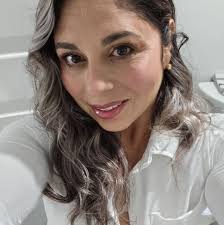 Who has replaced a jacuzzi tub with a walk-in shower and what was their  experience?