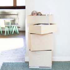 Its black metal frame scrolls along the side and top as a subtle and stylish accent. Storage Tower With Four Rotating Drawers Kunstbaron