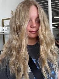 Hairstylist with creative eye for new cut and color