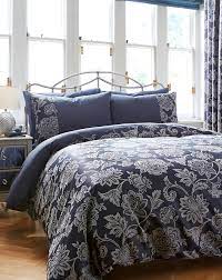 The duvet cover is fully reversible to a finer plaid print in red, green and navy. Navy Orla Jacquard Duvet Cover Set J D Williams