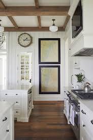 Farmhouse has gone from shabby chic to shabby sleek. Kitchen Hardwood Flooring Wide Plank Reclaimed Heart Pine Flooring Carries Throughout The Ho Farmhouse Style Kitchen Georgian Homes Hardwood Floors In Kitchen
