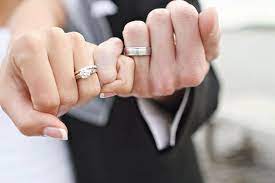 Choosing Your Wedding Photographer Bride And Groom Wearing Wedding Rings Wedding Picture Poses Groom Wedding Pictures Wedding Photos Poses