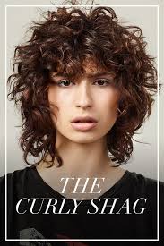 Choppy ends and layering give additional volume to your hair. Hair Trend News Looks And Hairstyles By L Oreal Professionnel Curly Hair Styles Curly Shag Haircut Curly Hair Inspiration