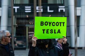 Tesla sent a video to sales staff before protests that featured smiling workers, a dog, and a reminder to 'stay vigilant'
