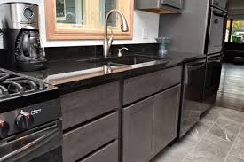 The process is quite easy, and it's a good way to save money by doing it. Black Pearl Color Countertops Black Granite Countertops Granite Countertops Price