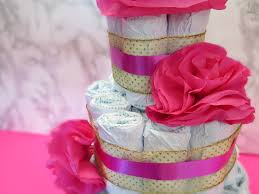 A baby nappy cake, diaper animal or diaper bouquet are a great gift for baby showers and for welcome homes. Modern Twist On The Baby Shower Diaper Cake