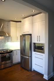Matte and gloss finish appliance doors also work well in these types of kitchens. High Gloss Kitchen Cabinet Doors