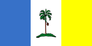 Bendera biru dengan bendera union jack disisi kiri atas, cakera putih berisi jata pulau pinang versi lama. Penang Wikipedia