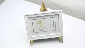 This is the stand i created to replace the stand that broke on the back of a decorative plaque that i wanted to display. How To Make A Stand For A Photo Frame With Pictures Wikihow