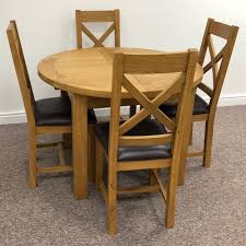 Solid wood dining/kitchen table and 4 chairs. Dover Oak Extending Round Dining Table 110 4 Chairs Moon Furniture