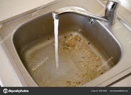 stainless steel sink plug hole close up