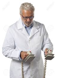 Automated external defibrillators (aeds) and implantable and wearable cardioverter defibrillators (icds and wcds) are devices that restore a normal heartbeat for people in sudden cardiac arrest. Doctor Using A Defibrillator At Hospital Stock Photo Picture And Royalty Free Image Image 16086791