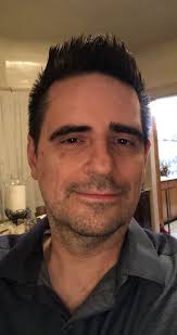 Jackie Gleason batting during an exhibition game for the Yankees.