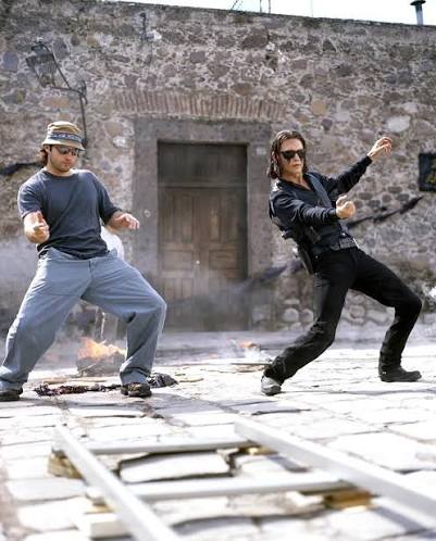 It's been 21 years since the release of Once Upon A Time In Mexico! Here's a  behind the scenes shot with Agent Sands played by Johnny Depp.