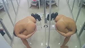 Spying on naked woman checking her epic ass in mirror - Voyeurs HD