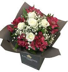 While women are spoilt for choice, men are the exact opposite. White Chic Roses And Pink Alstroemeria Flower Bouquet Katherine S Florists