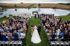 We're all for the retro slingback straps and pearl accents. Harvest View Barn Wedding Photo Bride Walking Down Aisle From Above Lancaster And Harrisburg Wedding Photographers In Pa