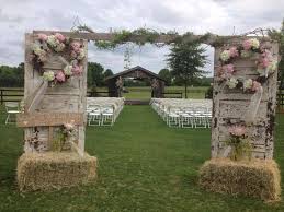 Weathered Worn The Perfect Look For A Rustic Wedding Fall Wedding Arches Rustic Wedding Flowers Country Wedding Decorations