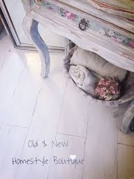 Laminate Flooring Painted With White Grey Chalk Paint Then Sanded Distressed To Look Painting Laminate Floors Painting Furniture Diy Furniture Makeover Diy