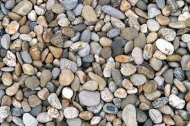 Gravel driveways need regular maintenance, especially in snowy areas where snow plows displace the gravel. River Rock Mulch Landscape Ideas Tips On Landscaping With Rocks And Pebbles