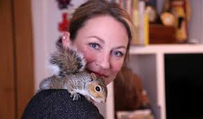 Squirrel Rescued From Roadside Now Hides Nuts in His Human's Hair as He  Prepares for Winter