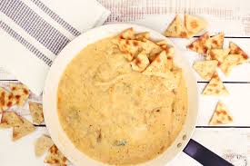 St Patrick S Day Guinness And Cheese Dip In 2020 Queso Recipe Recipes Chicken Dip Recipe